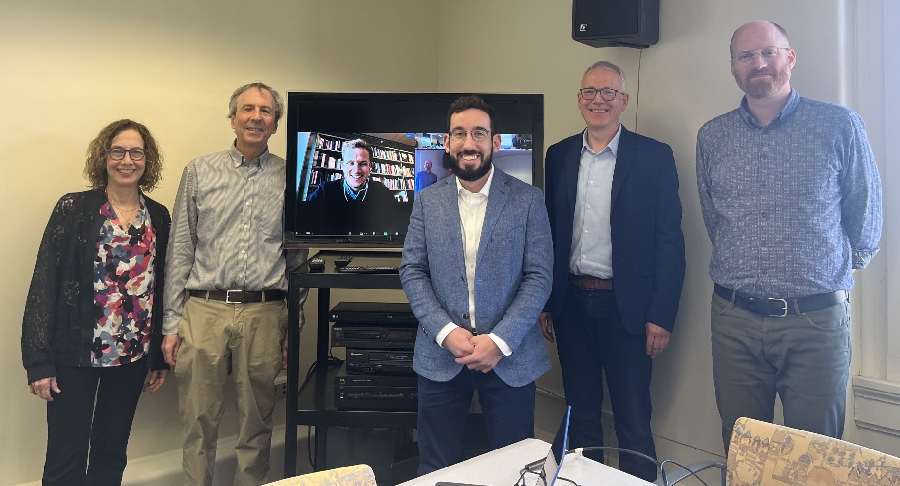 Justin Gregg with his committee. One member (Floris Meens) is on Zoom.