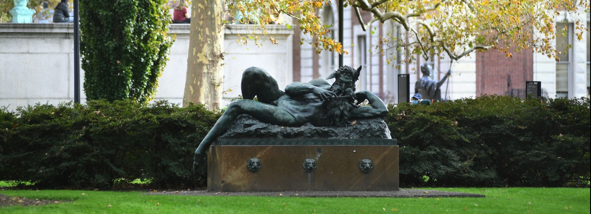 Statue or Pan in front of Dodge Hall