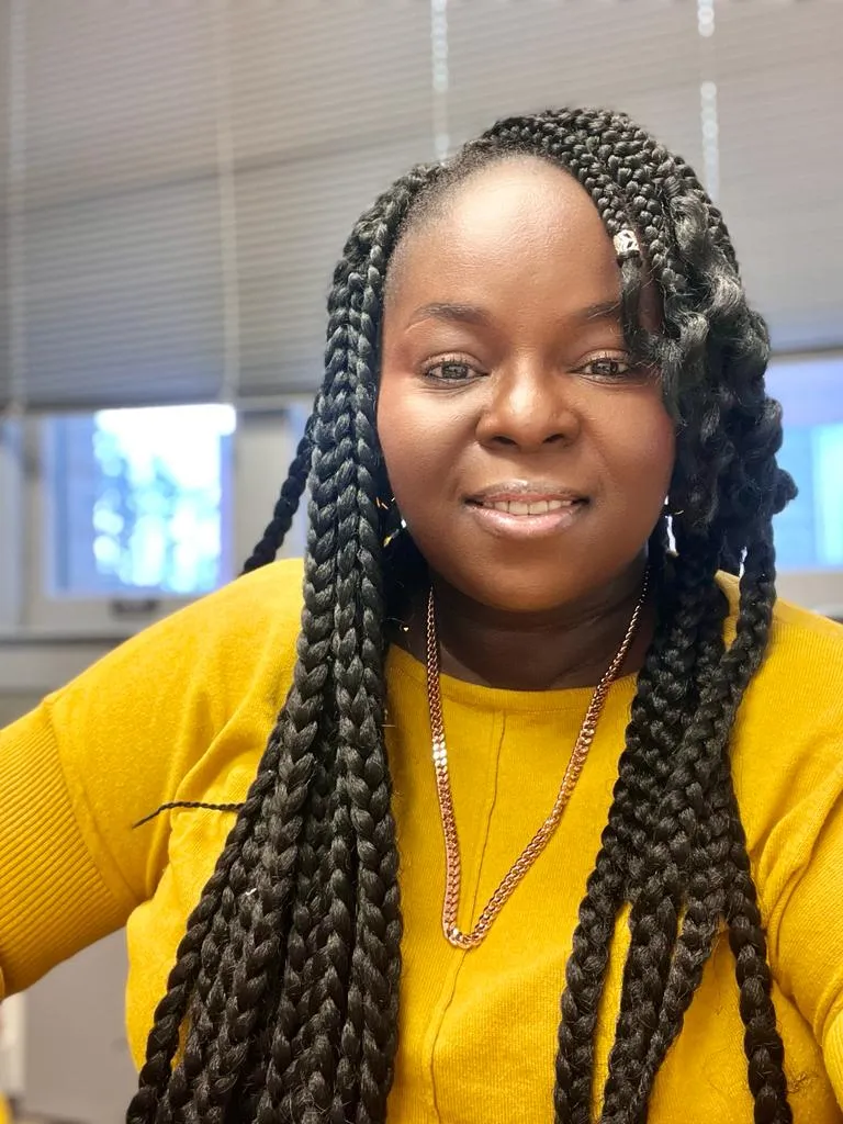 Ruth Opara in a yellow top